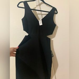 brand new black express dress never worn, side cutouts